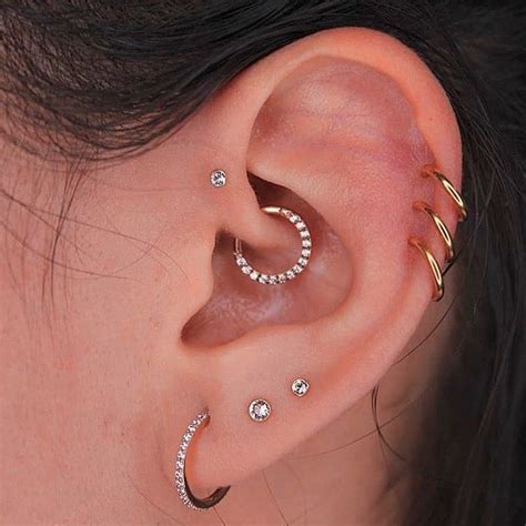 forward triple helix earrings|forward helix and daith piercing.